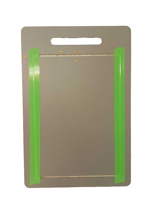 Pet door frame with green side seals and mounting holes, designed for airtight, energy-efficient pet access.