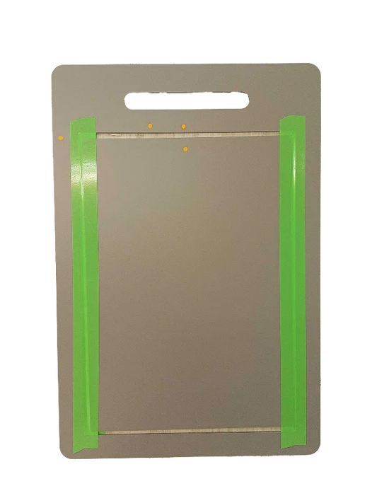 Pet door frame with green side seals and mounting holes, designed for airtight, energy-efficient pet access.