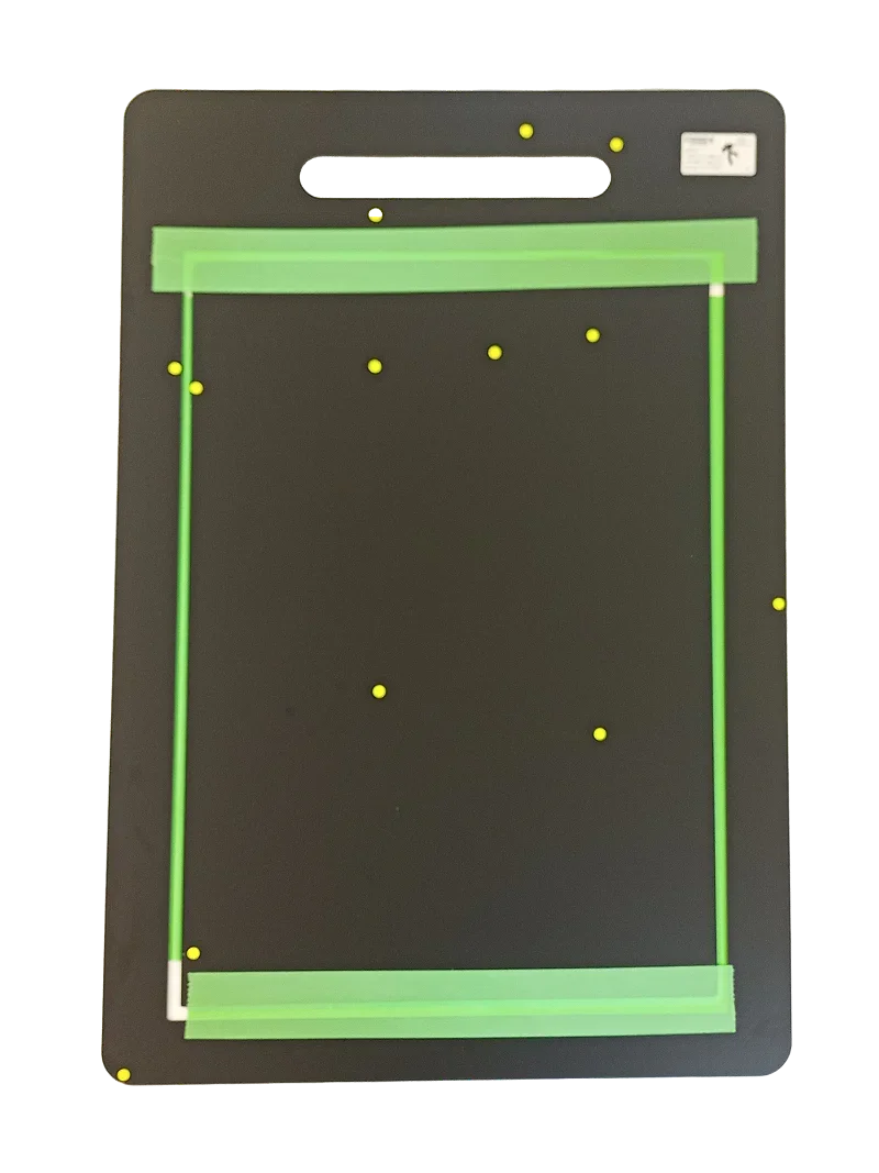 Black pet door frame with green sealing strips and yellow mounting points for secure, airtight installation
